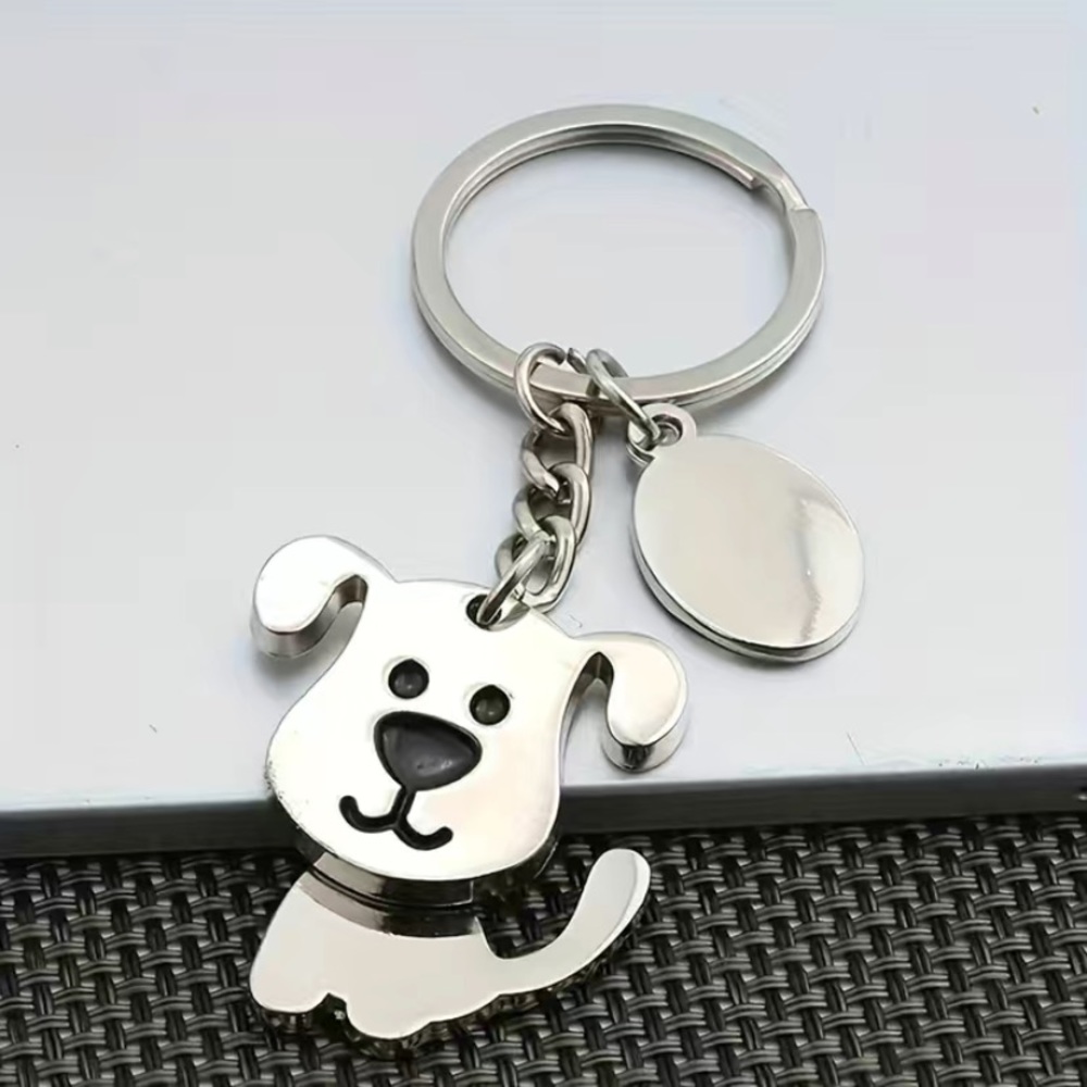 Key chain or bag accessory.  Dog with shaking, moving head